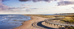 Panoramic view of a sandy beach on the Atlantic coast.
